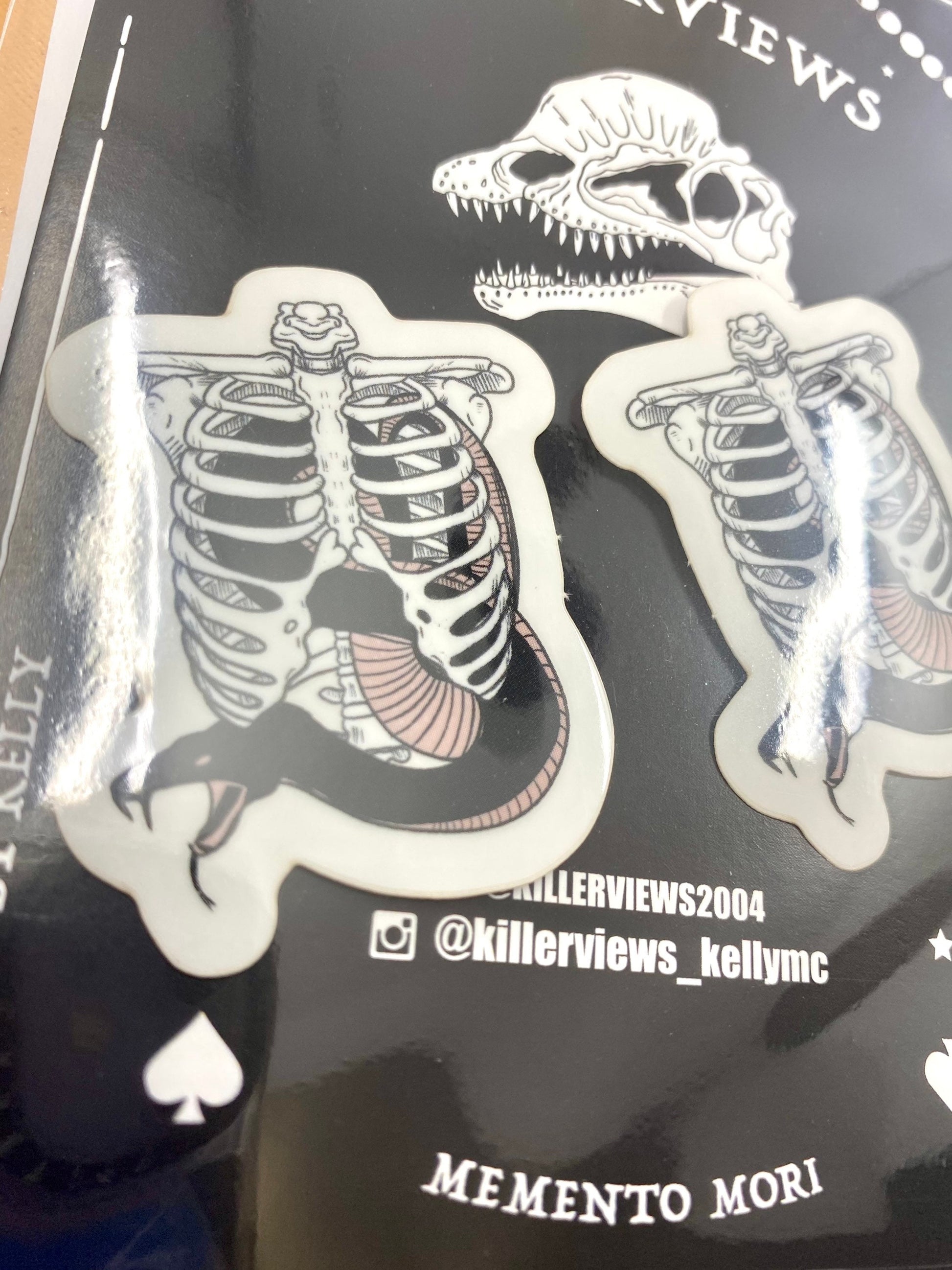 Snake in a Ribcage vinyl sticker pack of 2. With transparent effect vinyl.