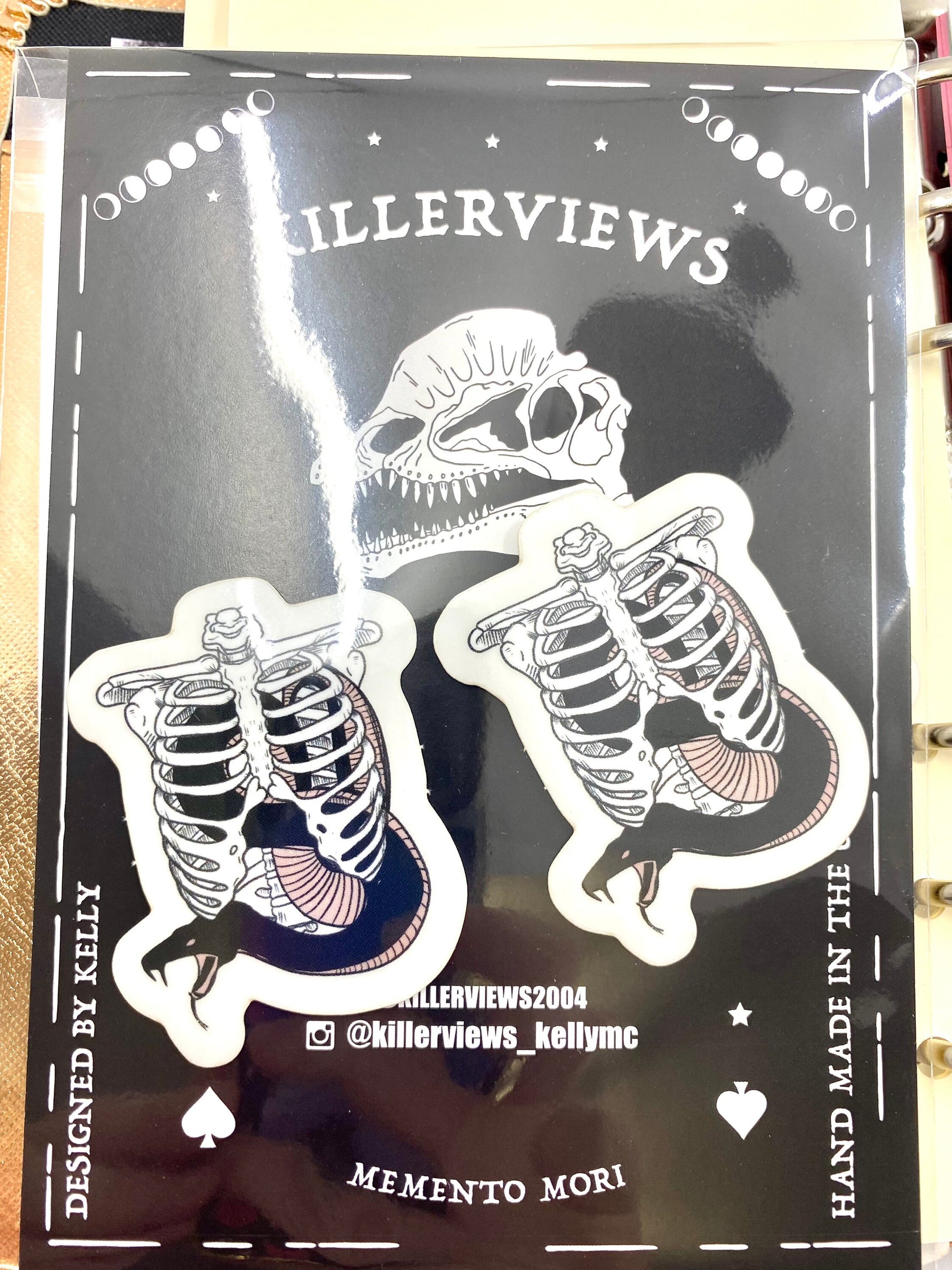 Snake in a Ribcage vinyl sticker pack of 2. With transparent effect vinyl.